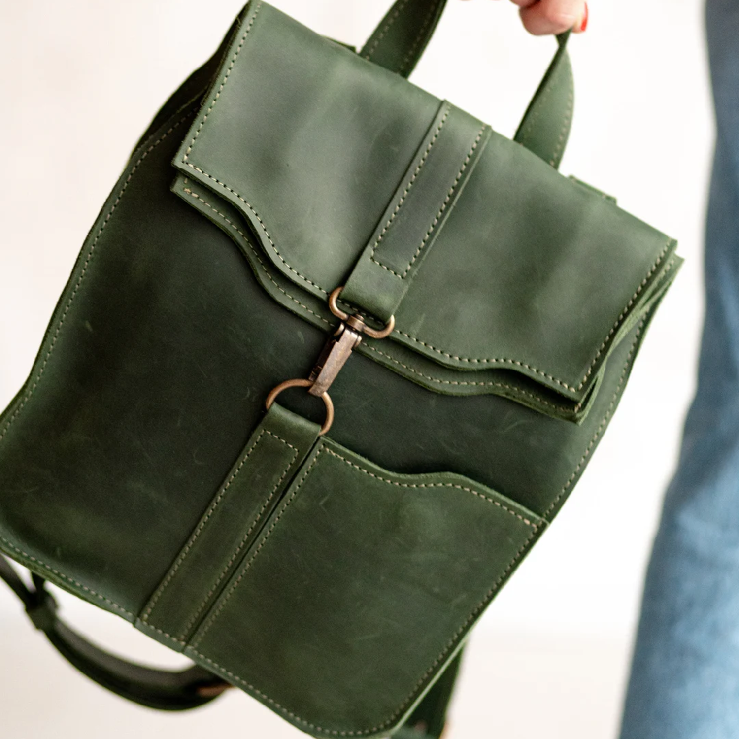 Deep Forest Green Textured Grain Compact Rectangular Flap Backpack With Antique Metal Clasp Closure, Front Slip Pocket And Integrated Top Carry Tab Hardware