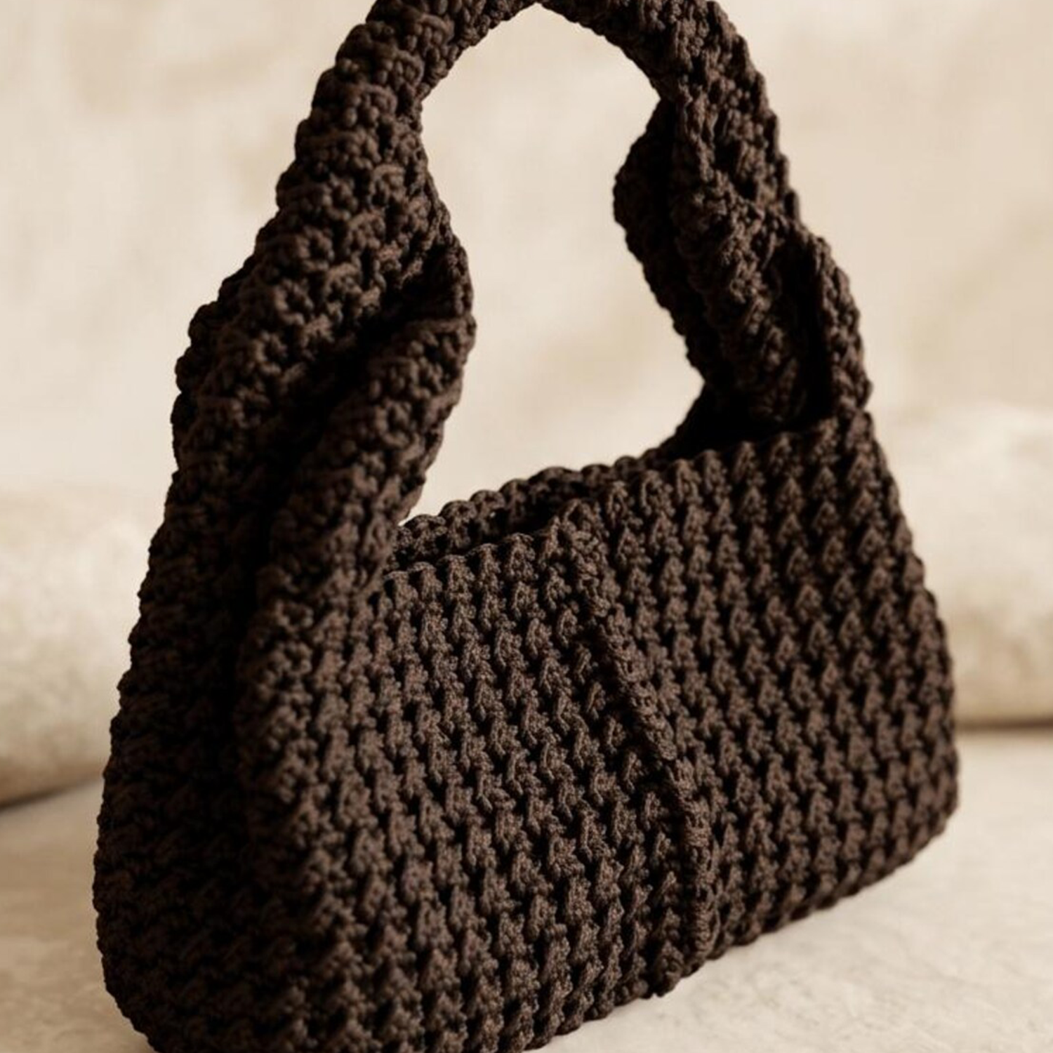 Deep Chocolate Brown Chunky Hand-Crocheted Crescent Hobo Bag With Matching Twisted Integrated Top Handle And Dense Textured Stitch Construction