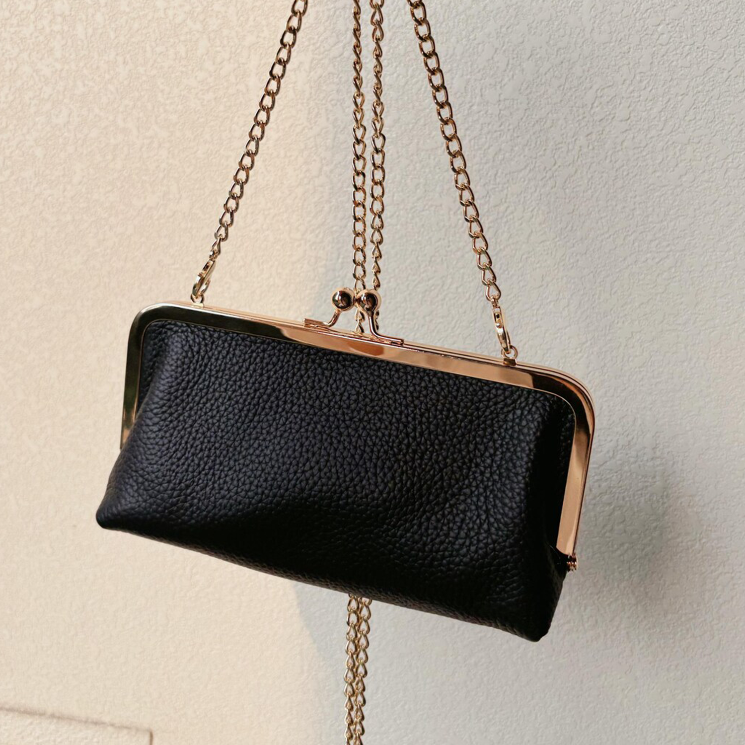 Matte Jet Black Soft Pebbled Grain Elongated Kiss-Lock Clutch With Polished Gold Metal Frame, Spherical Dual Ball Clasp And Detachable Link Chain Shoulder Strap Hardware