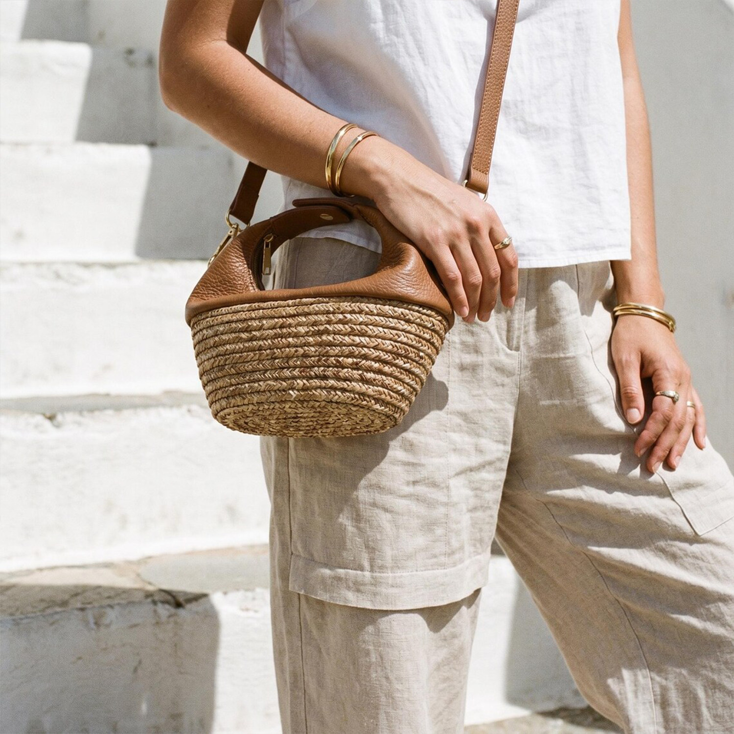 Warm Tan Pebbled Leather Crescent Basket Bag With Braided Natural Straw Base, Integrated Cutout Hand Loop And Detachable Matching Leather Shoulder Strap Hardware