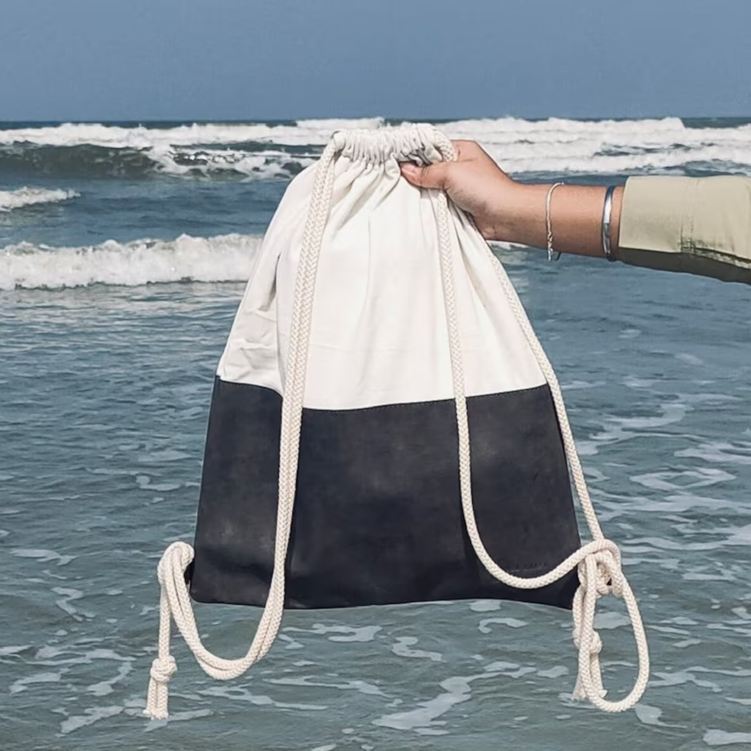 Two-Tone Color Block Drawstring Sack Backpack With Pale Woven Upper Panel, Textured Contrast Base And Twisted Braided Dual Shoulder Cords