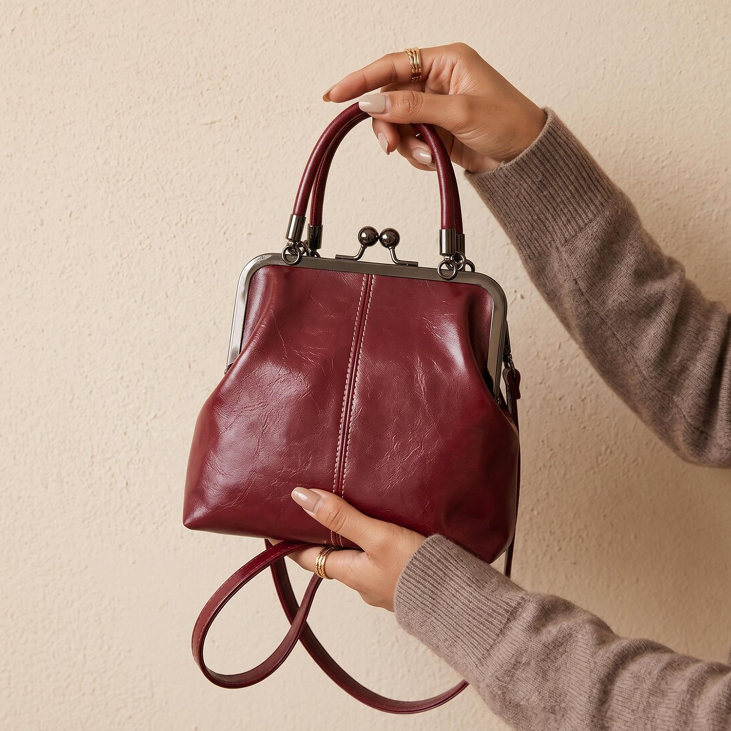 Dual Tone Glossy Crinkled Vintage Kiss-Lock Frame Handbag With Central Vertical Stitch Seam, Detachable Matching Shoulder Strap And Spherical Dual Ball Clasp Hardware
