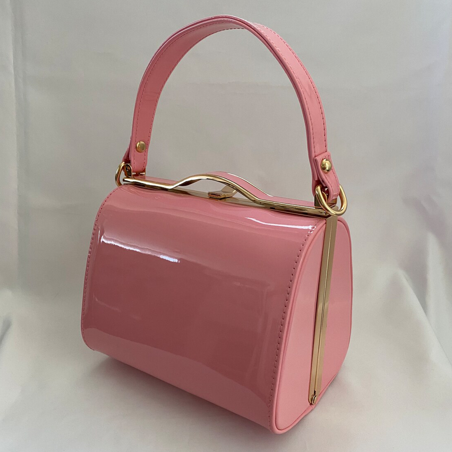 Soft Carnation Pink High-Gloss Patent Curved Rectangular Vintage Box Handbag With Wavy Gold Top Clasp Frame, Fixed Curved Top Handle And Detachable Polished Link Chain Hardware